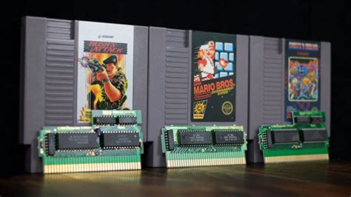 How do you take games out of a NES?